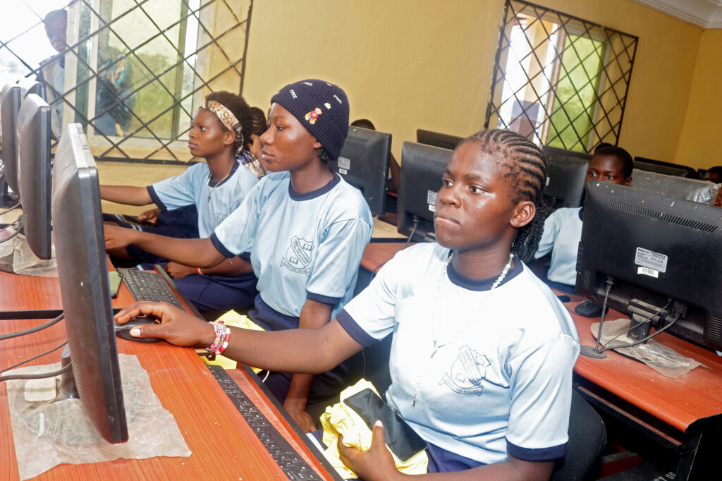 Students of Community Secondary School, Okporoenyi, test-running the digital devices at the Community Connectivity Hub.
