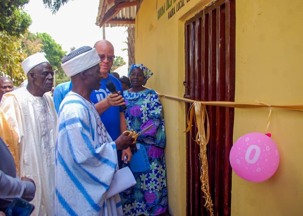 David Peter, Esq., Wazirin Kagoro and representative of the Chief's of Kagoro about to cut the ribbon at the Kukum-Daji Biyan Zit Connectivity Hub